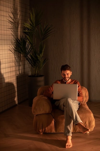 A person sitting comfortably at home, illuminated by the glow of a laptop screen, participating in a virtual trivia game. They are smiling and engaged, with visible signs of concentration and enjoyment. The background includes elements of a cozy living space, such as bookshelves and a comfortable chair.