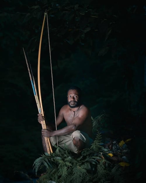 A detailed close-up of a jungler champion clearing a jungle camp, showcasing the champion's abilities and the surrounding environment. The image should highlight the visual details of the character model and the game's graphics.
