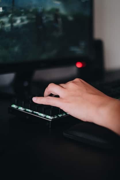 A person's hand pressing a button on a keyboard, with a blurred game interface in the background, representing user interaction and critical input.
