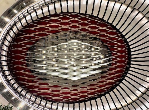 A close-up internal view of a high-end, quiet CPU cooler, showcasing its intricate heat pipes, aluminum fins, and sound-dampening fan mounts.