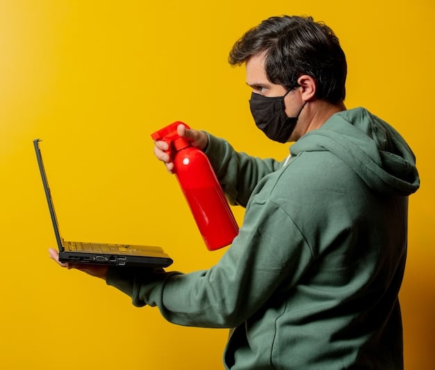 A person using a can of compressed air to clean dust from a PC heatsink, illustrating good maintenance practice.
