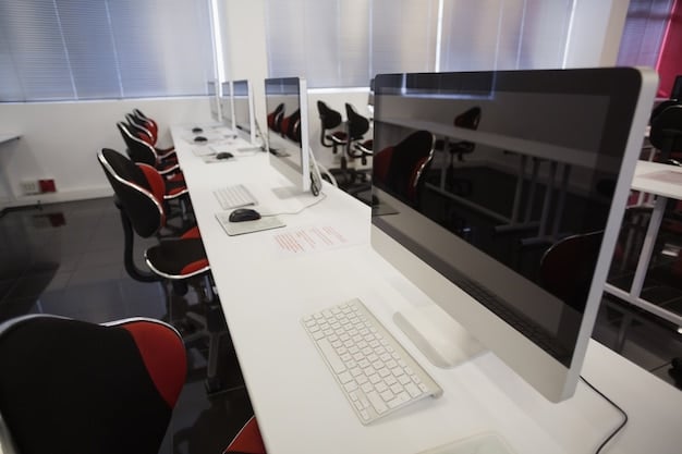 A modern esports training room with high-end gaming PCs, ergonomic chairs, and multiple monitors set up for practice. The room is clean, well-lit, and designed for optimal performance.