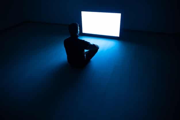 A silhouette of an esports player sitting alone, looking disheartened, against a backdrop of muted gaming lights, symbolizing feelings of isolation and depression in the competitive gaming world.