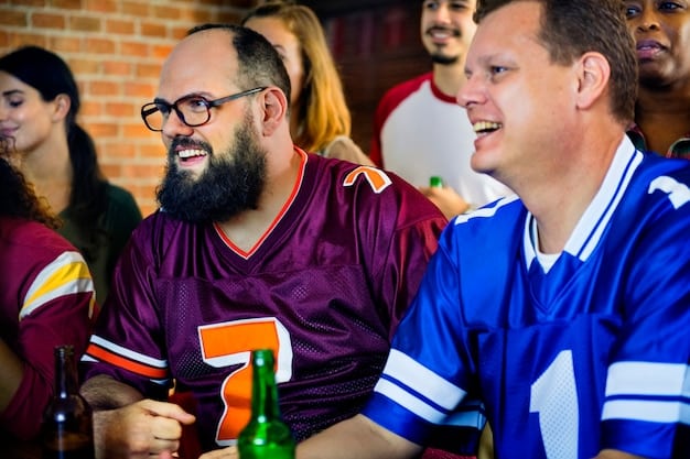 A close-up shot of two League of Legends players backstage at an LCS event in the US, intensely discussing strategy. They are wearing team jerseys with visible sponsor logos.