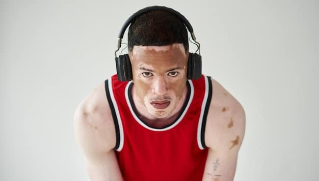 A close-up shot of an esports athlete's face, showing signs of fatigue and stress. The athlete is wearing a headset, and their eyes are bloodshot. The background is blurred, focusing on the emotional toll that competitive gaming can take. Mention 'Esports Athlete Burnout: 3 Proven Strategies to Extend Your Competitive Career Beyond 5 Years' in the description.